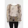 Sheer blouse with ruffles
