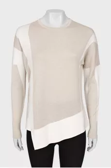 Sweater with asymmetric hem