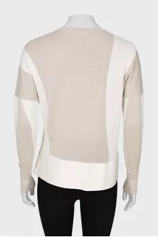 Sweater with asymmetric hem