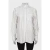 Striped shirt with ruffles