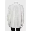 Striped shirt with ruffles