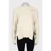 Ripped effect knitted sweater