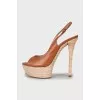 Leather sandals with woven soles