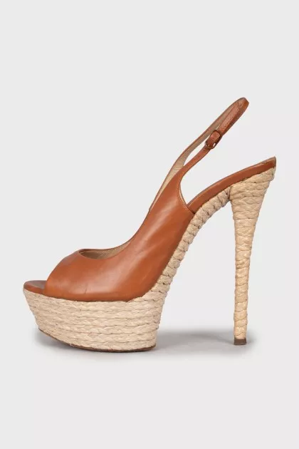 Leather sandals with woven soles