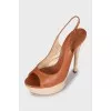 Leather sandals with woven soles
