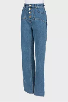 Jeans with asymmetrical button seams