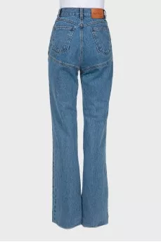 Jeans with asymmetrical button seams