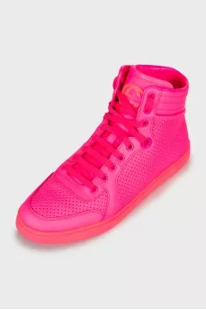 Bright pink trainers with perforations 