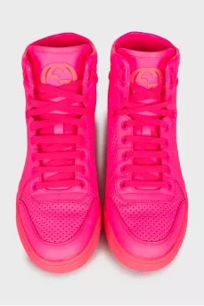 Bright pink trainers with perforations 