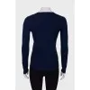 Navy blue sweater with embroidered logo
