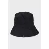 Black hat with tag