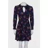 Blue dress in print with ruffles