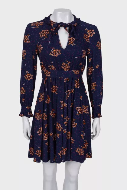 Blue dress in print with ruffles