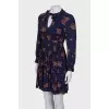 Blue dress in print with ruffles