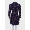 Blue dress in print with ruffles