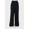 Dark green loose fit trousers