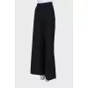 Dark green loose fit trousers