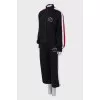 Black tracksuit with tag