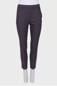 Trousers of the combined color in a cage