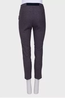 Trousers of the combined color in a cage