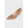 Brown pointed toe shoes