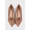 Brown pointed toe shoes