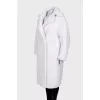 White double-breasted fur coat