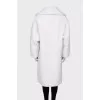 White double-breasted fur coat