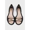 Black ballerinas with a bow