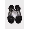 Leather sandals with metallic decoration