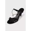 Leather sandals with metallic decoration