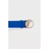 Blue leather belt with tag