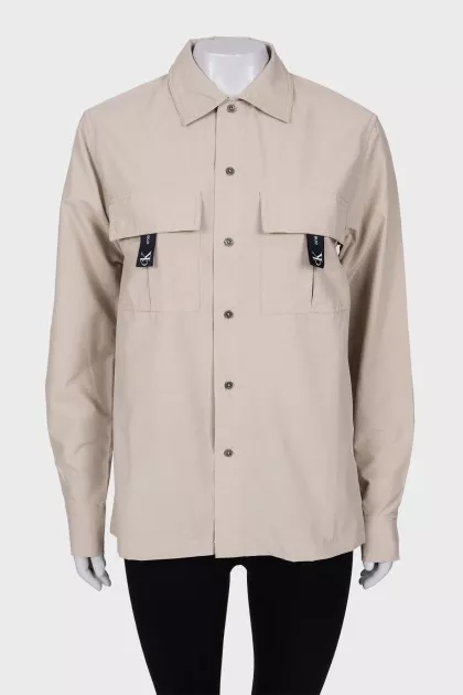 Beige shirt with tag