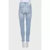 Light blue raw hem jeans