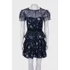 Dress decorated with rhinestones and embroidery