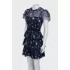 Dress decorated with rhinestones and embroidery