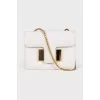 White bag with golden hardware
