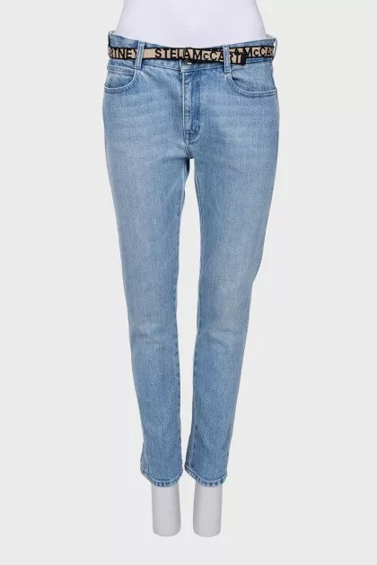 Light blue jeans with belt