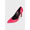 Pink pointed toe pumps