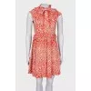 Dress with ruffles in print