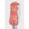 Dress with ruffles in print