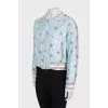 Blue bomber jacket with sequins