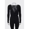 Black blouse with drapery and lace