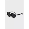 Black sunglasses with shaped frames 