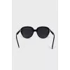 Black sunglasses with shaped frames 