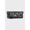 Black bag with golden rhinestones