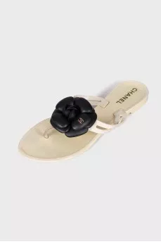 White slippers decorated with flowers