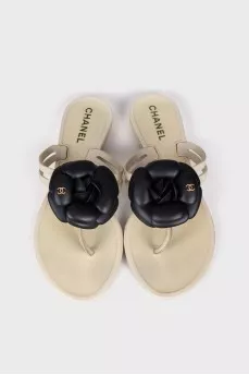 White slippers decorated with flowers