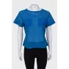 Blue T-shirt with perforations