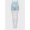 Shorts in floral print with zip